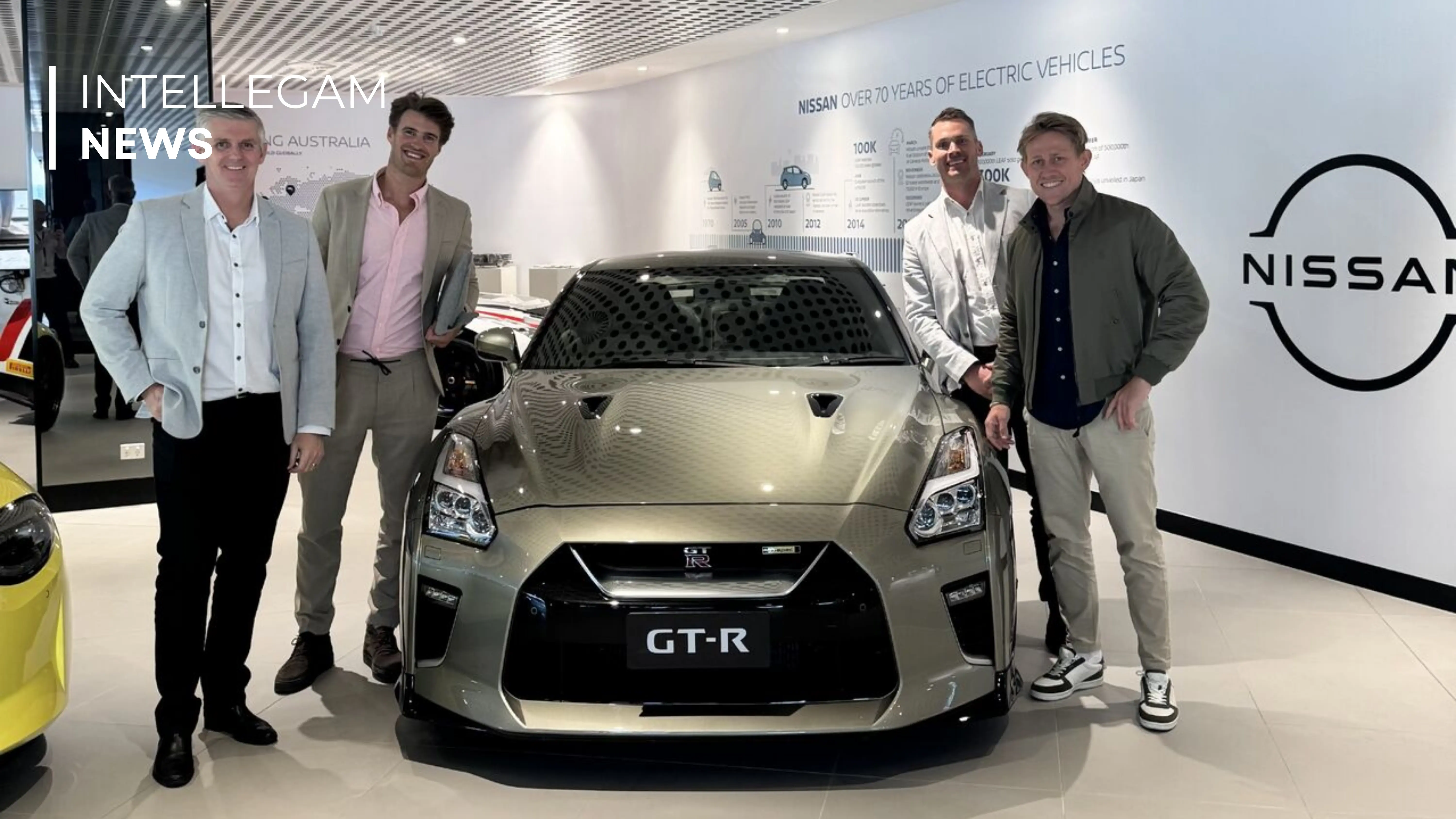 Intellegam team at Nissan showroom with GT-R