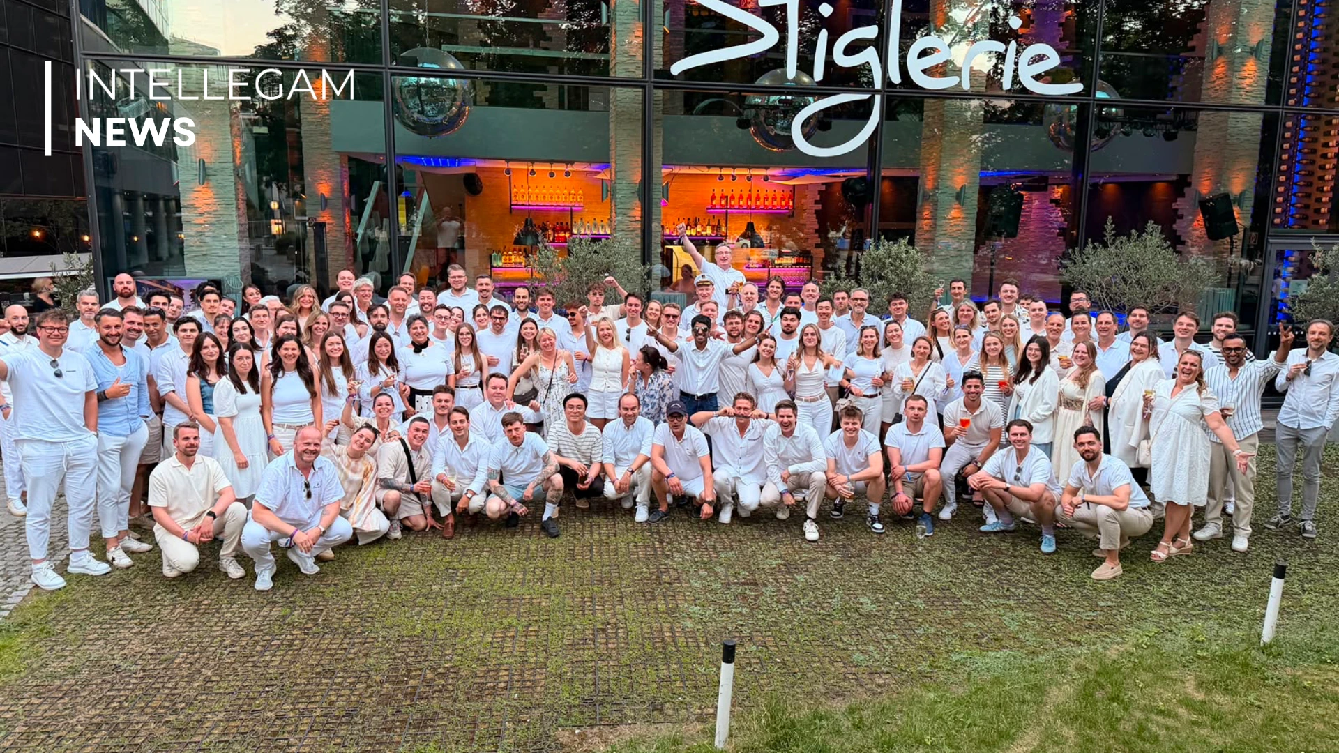 INTELLEGAM team gathered together at a company event